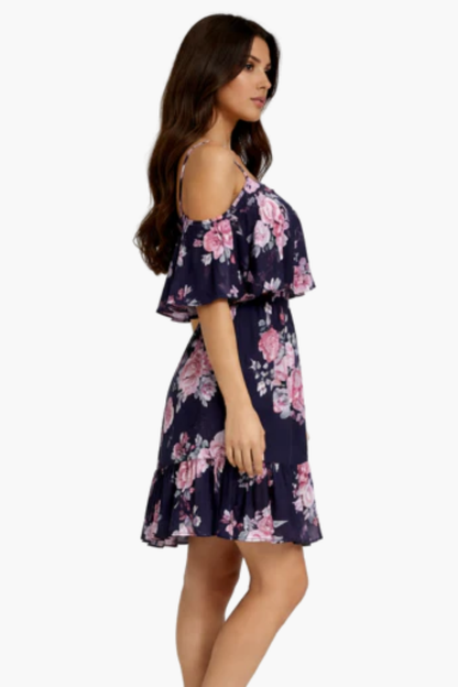 Vestito corto a fiori con spalle scoperte e balze