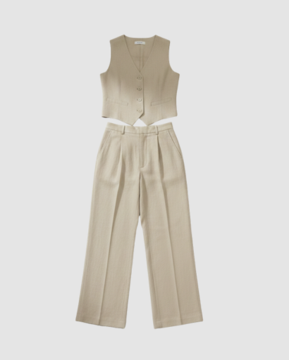 Completo tailleur da donna con gilet smanicato e pantaloni larghi a vita alta con pinces
