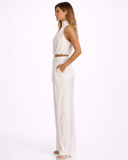 Completo donna top drappeggiato collo alto e pantaloni larghi a vita alta