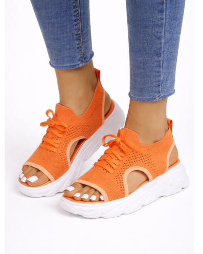Sandali sneakers traforati stringati con suola spessa