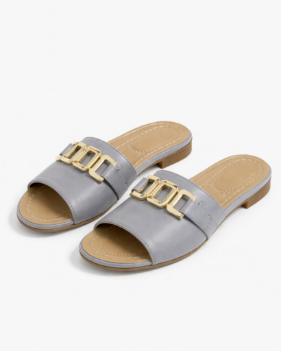 Mules da donna con cinturino largo e fibbia decorativa in metallo